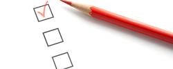 Survey Questionnaire with Red Pencil and Check Mark